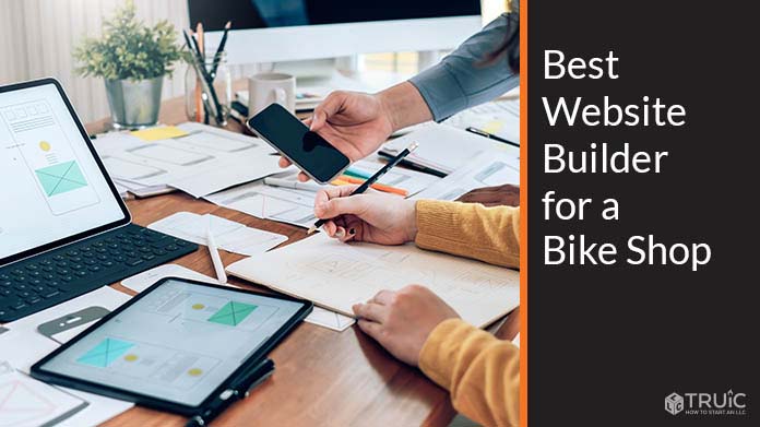 Two professional people building a website for their business.