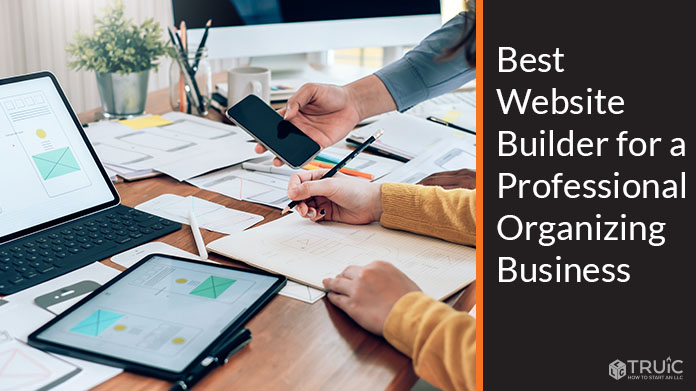Two professional people building a website for their business.