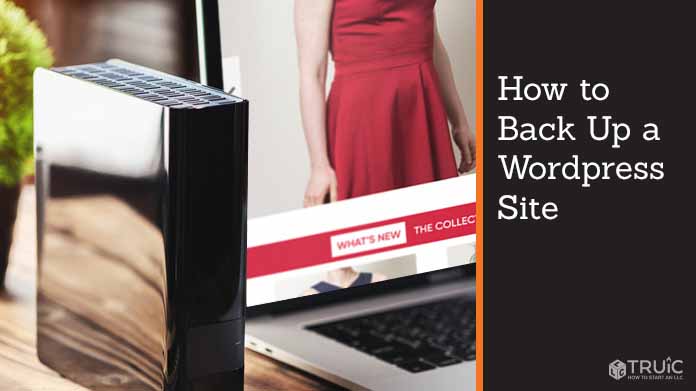 Laptop showing eCommerce site with external hard drive next to it.