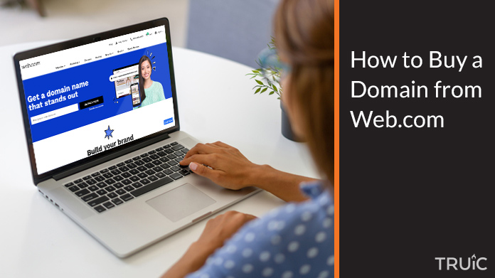 Woman buying a domain from Web.com.