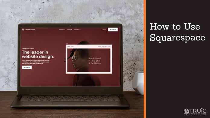 Laptop on desk with Squarespaces website on the screen.