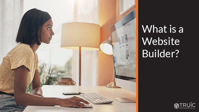 Woman looking at website builder on her computer.
