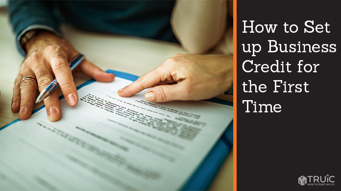 a person helping someone set up business credit