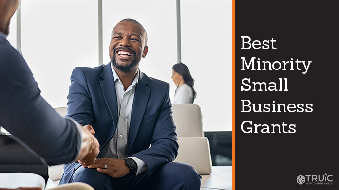 Business people shaking hands.