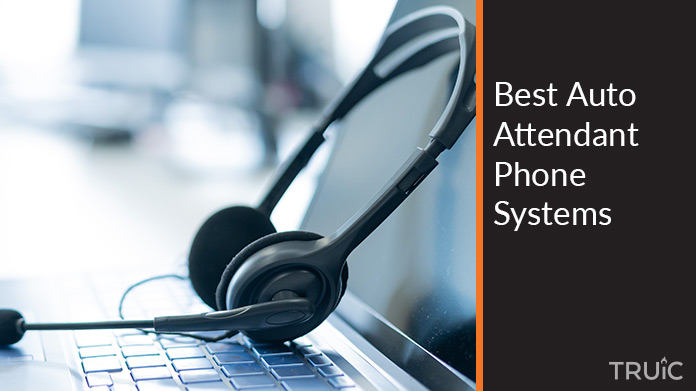 Call headset sitting on a keyboard.