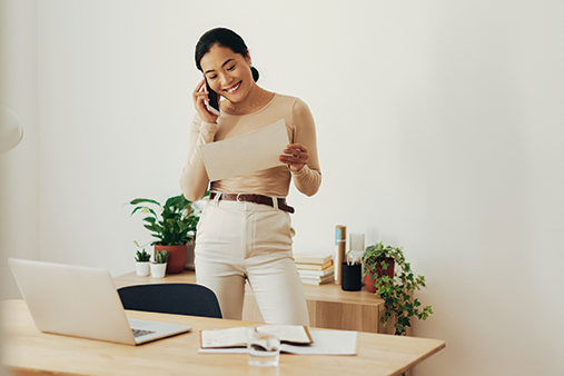 Person on phone researching the best vanity phone services.