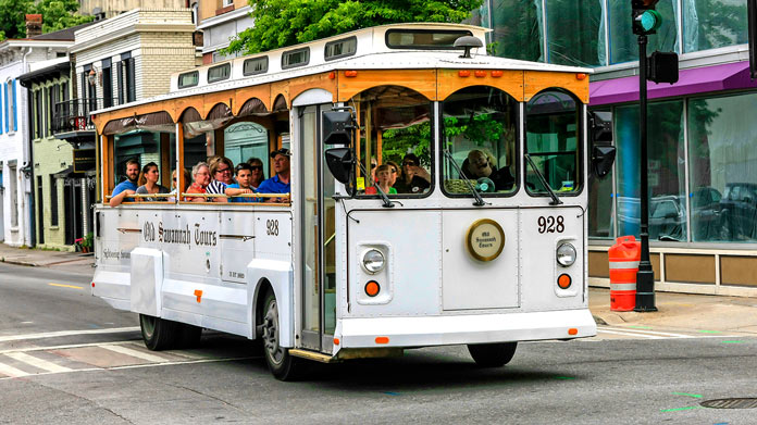 A touring bus full of passengers