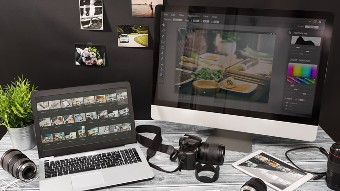 Computers with photos on their screens