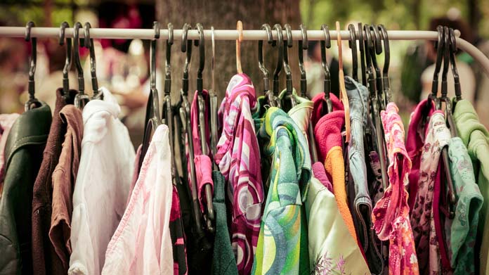 A row of clothes on hangers