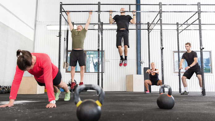 people working out in a CrossFit Gym