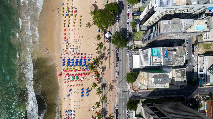 A photo of a beach from directly above by a drone