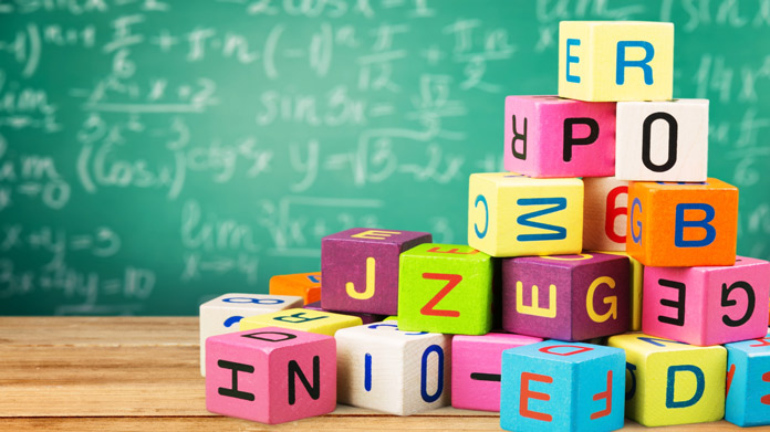 A pile of colorful lettered blocks