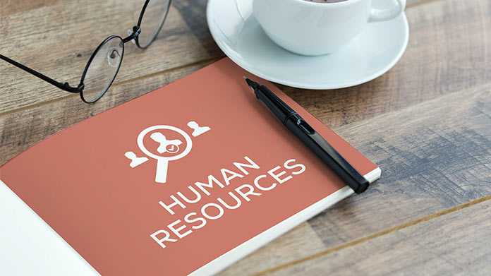 An open book with the words - human resources - written on it