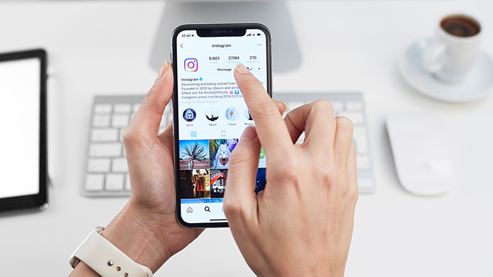 phone screen showing the Instagram app with logo