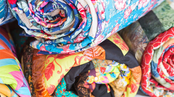Rolled-up multicolor quilts
