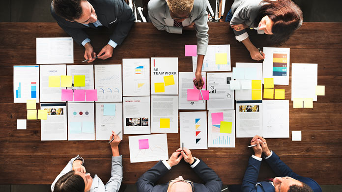 A group of business people managing a project