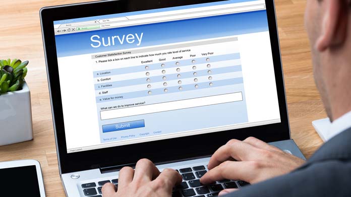 A computer with a survey on its screen