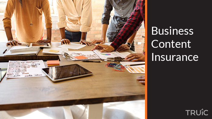 Content creators working together around a desk.