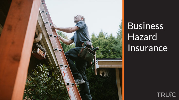 Man with a tool belt climbing a ladder to the roof.