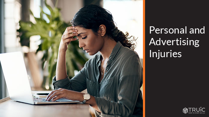 Woman looking stressed on her laptop.