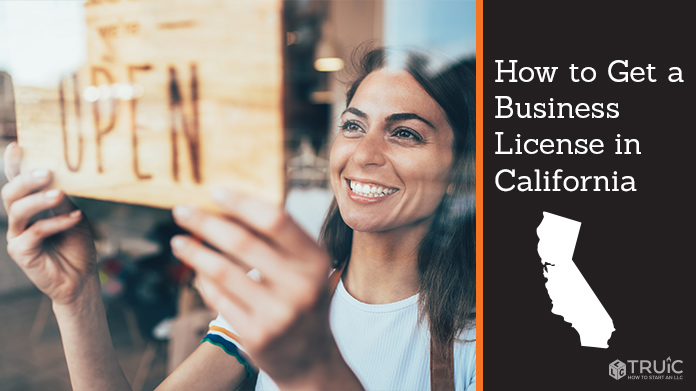 Woman holding open sign after getting her business license