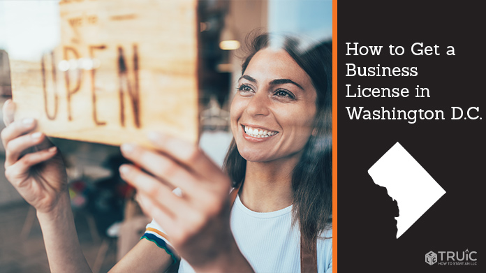 Woman holding open sign after getting her business license