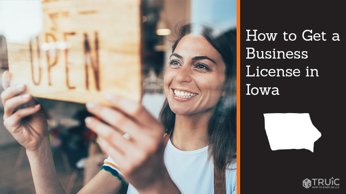 Woman holding open sign after getting her business license