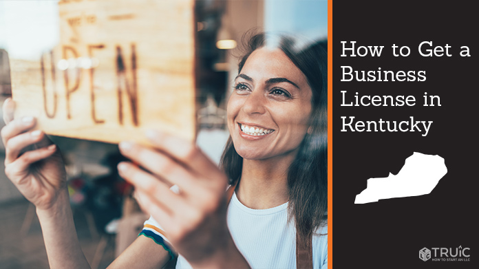 Woman holding open sign after getting her business license
