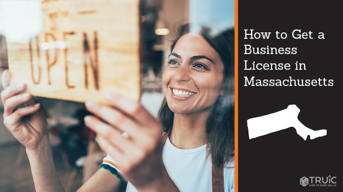 Woman holding open sign after getting her business license