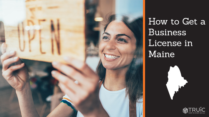 Woman holding open sign after getting her business license