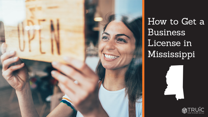 Woman holding open sign after getting her business license