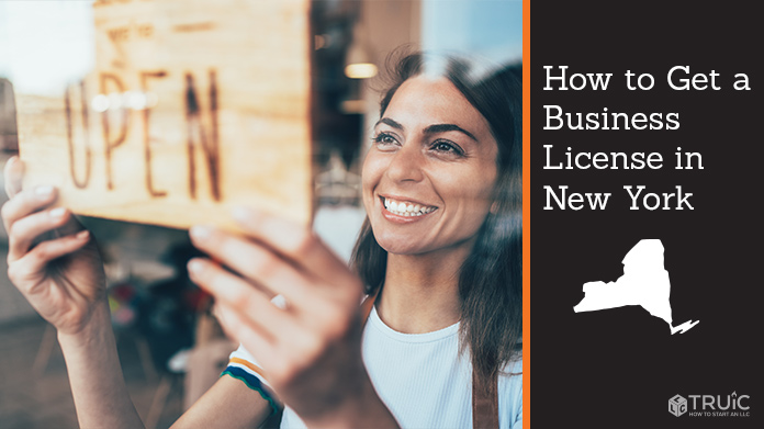 Woman holding open sign after getting her business license