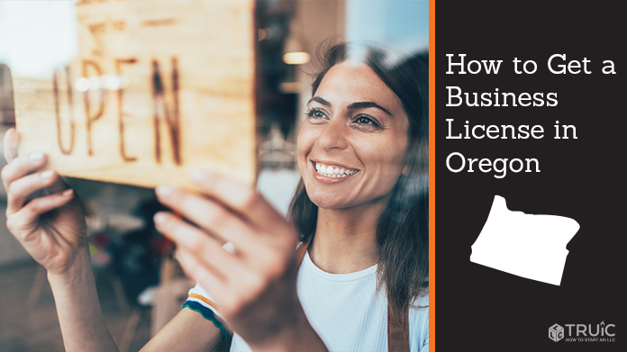 Woman holding open sign after getting her business license