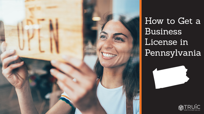 Woman holding open sign after getting her business license