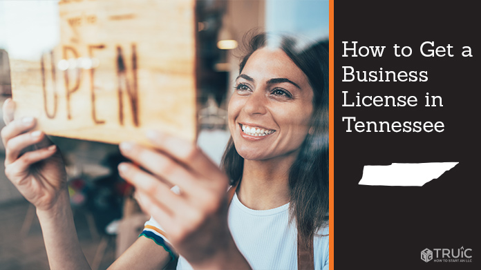 Woman holding open sign after getting her business license
