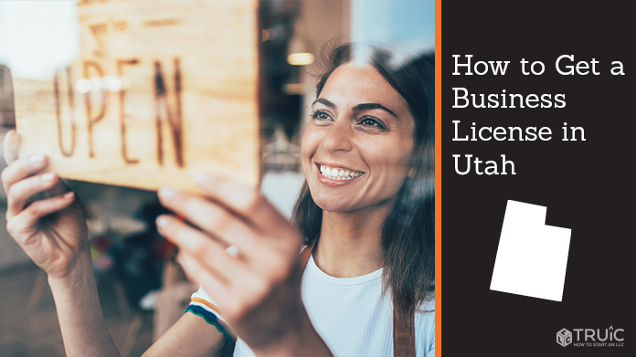 Woman holding open sign after getting her business license