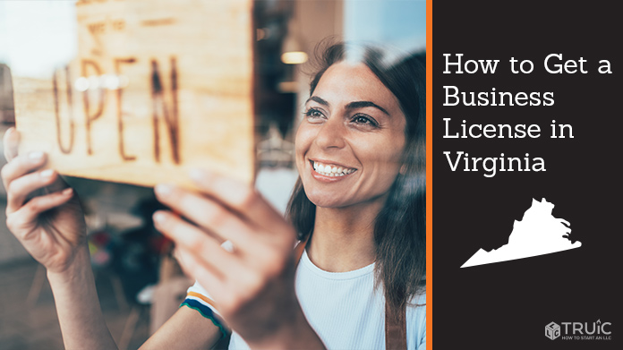 Woman holding open sign after getting her business license