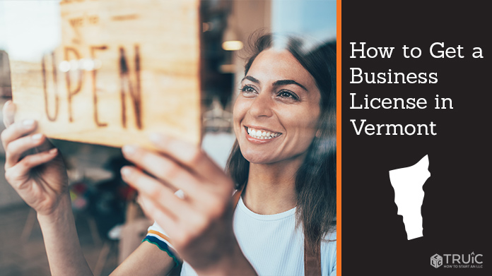 Woman holding open sign after getting her business license