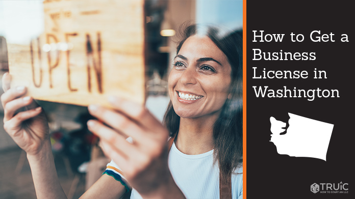 Woman holding open sign after getting her business license
