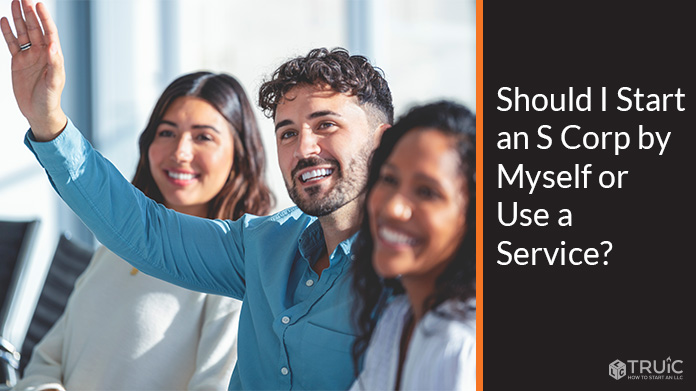 Smiling entrepreneurs at business meeting