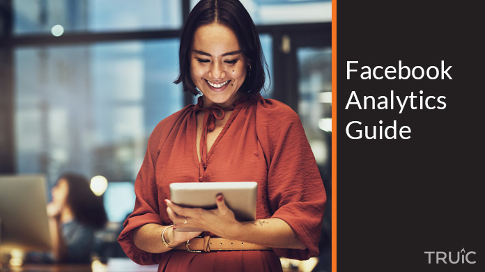 Woman looking at the Facebook analytics guide.