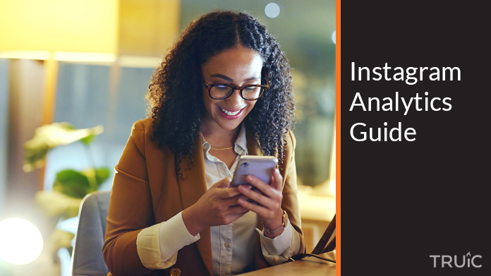 Woman looking at the Instagram analytics guide.