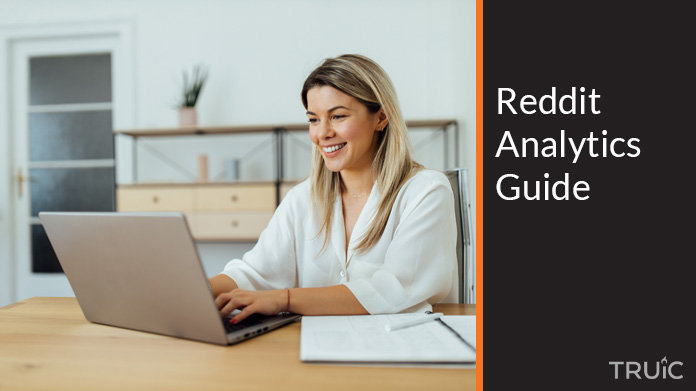 Woman looking at the Reddit analytics guide.