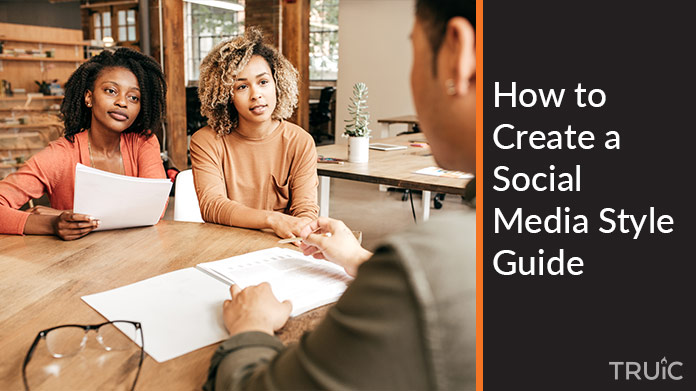 Coworkers working at a conference table.