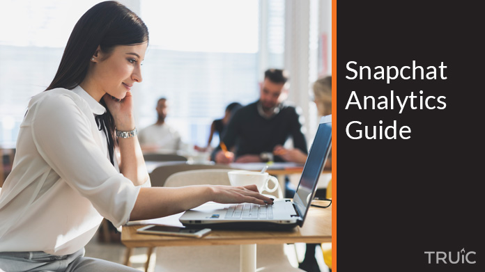 Woman looking at the Snapchat analytics guide.