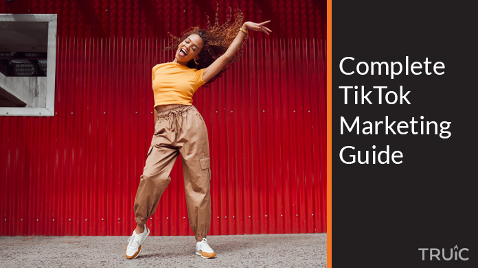 Woman dancing for TikTok marketing campaign.