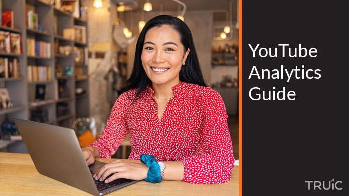 Woman looking at the YouTube analytics guide.